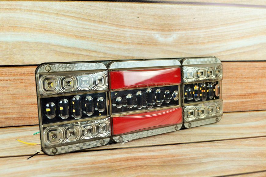 Ліхтар LED задній 12&ndash;24V з біжучим поворотом, чорне скло (46&times;13 см) AL-00414 фото